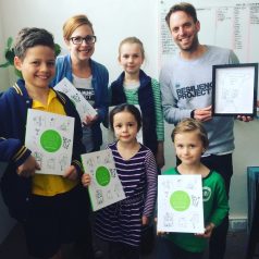 Presenting books to The Resilience Project, our crowdfunding partner.